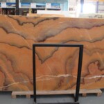 Orange nuvolato onyx slab and tiles for countertops