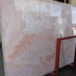 Pink onyx slab and tiles for countertops