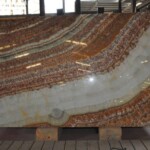 Ruby red onyx slab and tiles for countertops