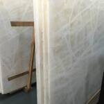 White ice onyx slab and tiles for countertops